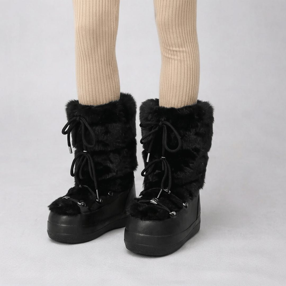 Détail de la fourrure synthétique des bottes de neige femme